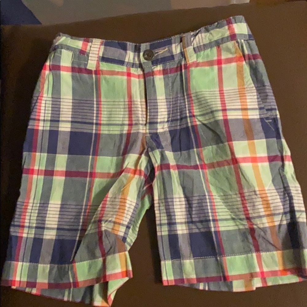 Plaid Shorts includes green, blue, and red colors.